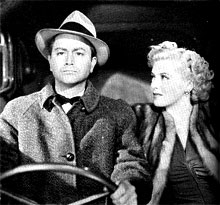 With Robert Young in SLIGHTLY DANGEROUS